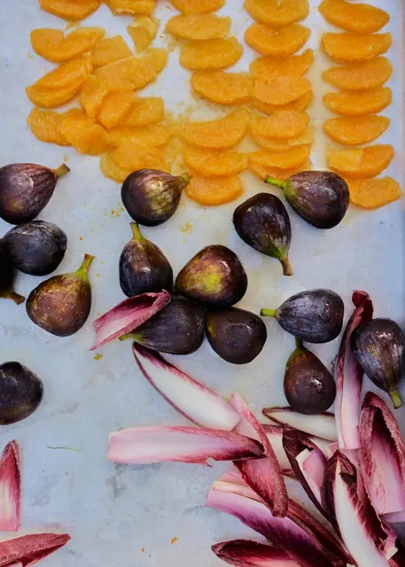Fresh figs, orange segments and red endive