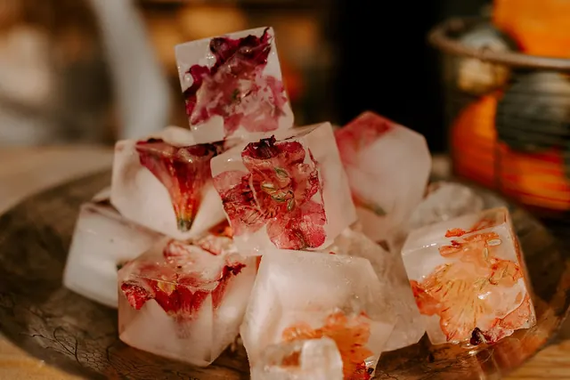 Ice cubes with frozen flower petals